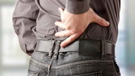 Stomach and Back Pain: 8 Causes & What to Do