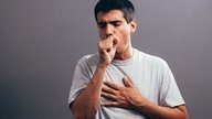 Coughing Up White Phlegm: 6 Causes & What to Do