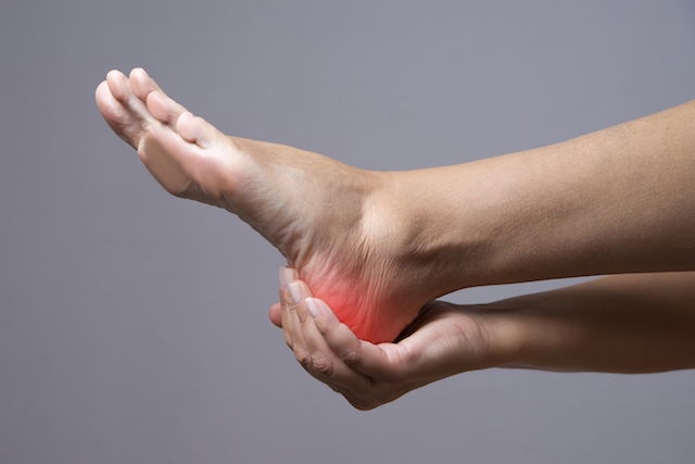 Painful Heel With Red Spot On Woman's Foot Stock Photo By