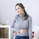 Dor na boca do estômago: 6 causas e o que fazer