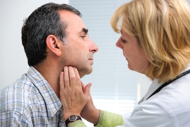 Pain in the front of your neck to the side of your windpipe?